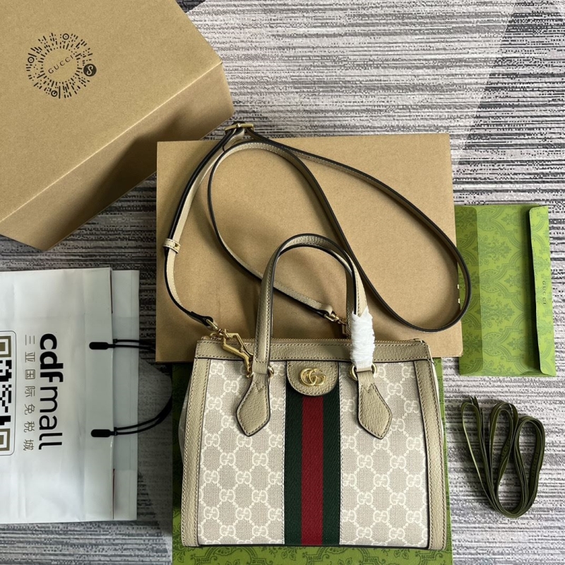 G*u*i top handle bags